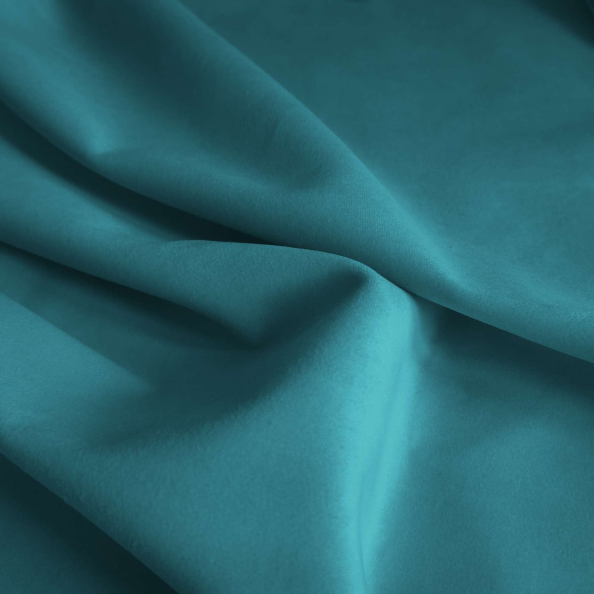 Tessuto Vogue Turquoise 017 drappeggiato – velluto idrorepellente effetto cangiante, colore azzurro