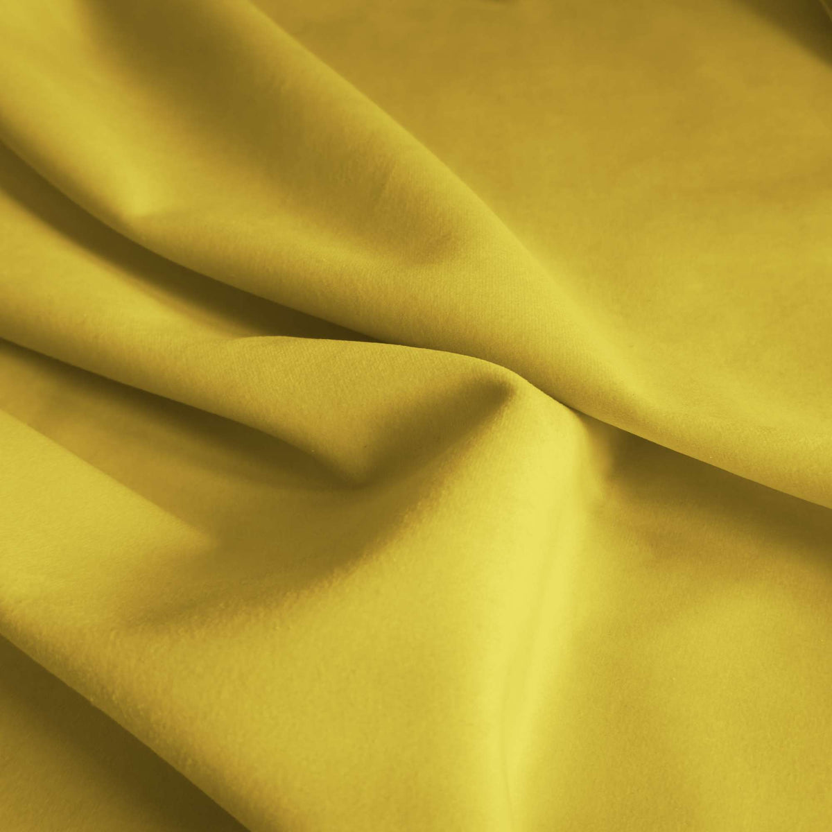 Tessuto Vogue Yellow 028 drappeggiato – velluto idrorepellente effetto cangiante, colore giallo