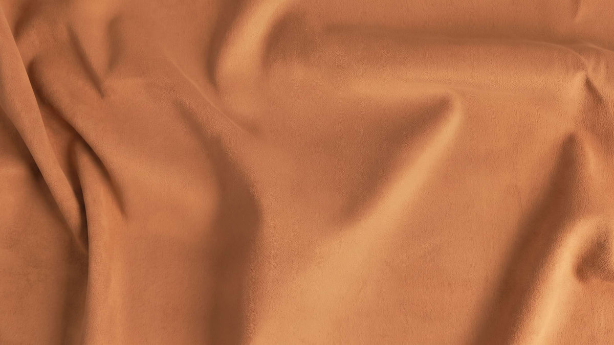 Macro del tessuto Camoscio: superficie scamosciata e opaca