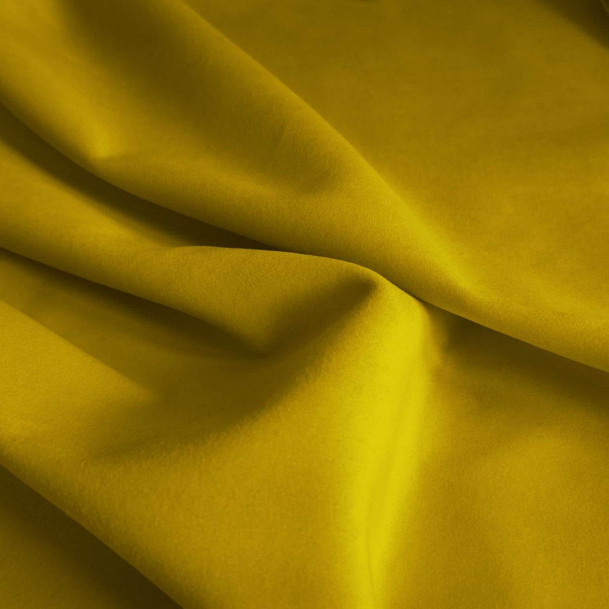 Tessuto Vogue Gold 029 drappeggiato – velluto idrorepellente effetto cangiante, colore giallo